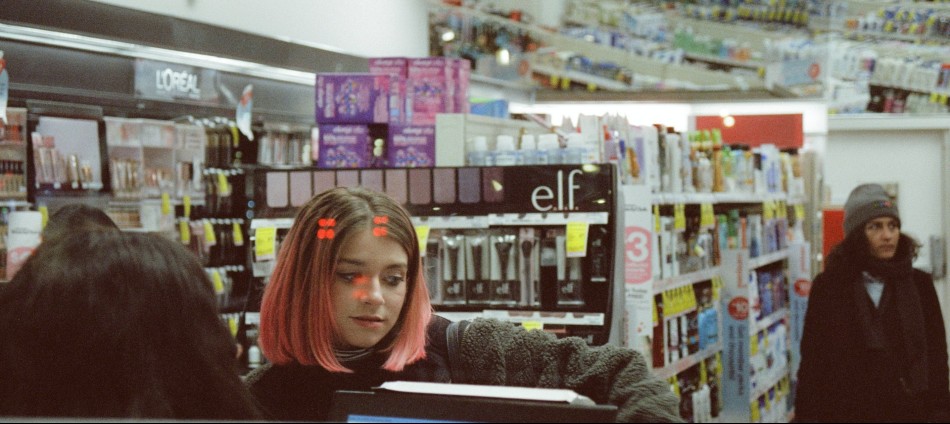 Student girl with pink hair buying Modafinil from pharmacy